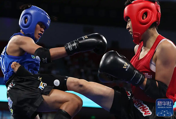 世运探馆ing丨自由搏击激战正酣 “力与美”的交响在这里共鸣