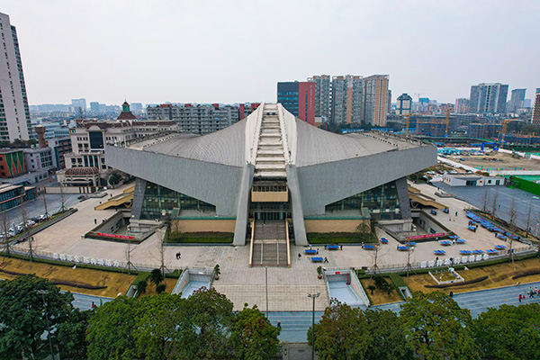 世运探馆ing丨自由搏击激战正酣 “力与美”的交响在这里共鸣